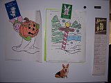 My fridge artwork. I work at the Boys and Girls Club. My boyfriend's mom gave us the little doggie magnet. One day we will adopt
